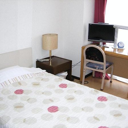 Business Inn Grandeur Футю Экстерьер фото