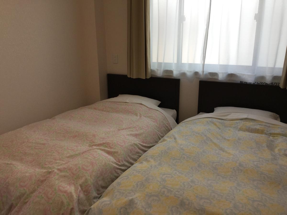 Business Inn Grandeur Футю Экстерьер фото