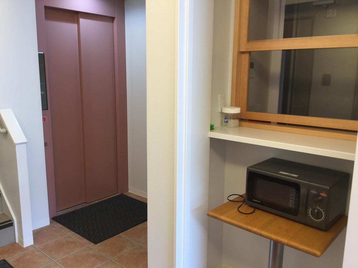 Business Inn Grandeur Футю Экстерьер фото