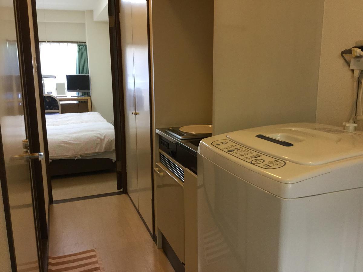 Business Inn Grandeur Футю Экстерьер фото